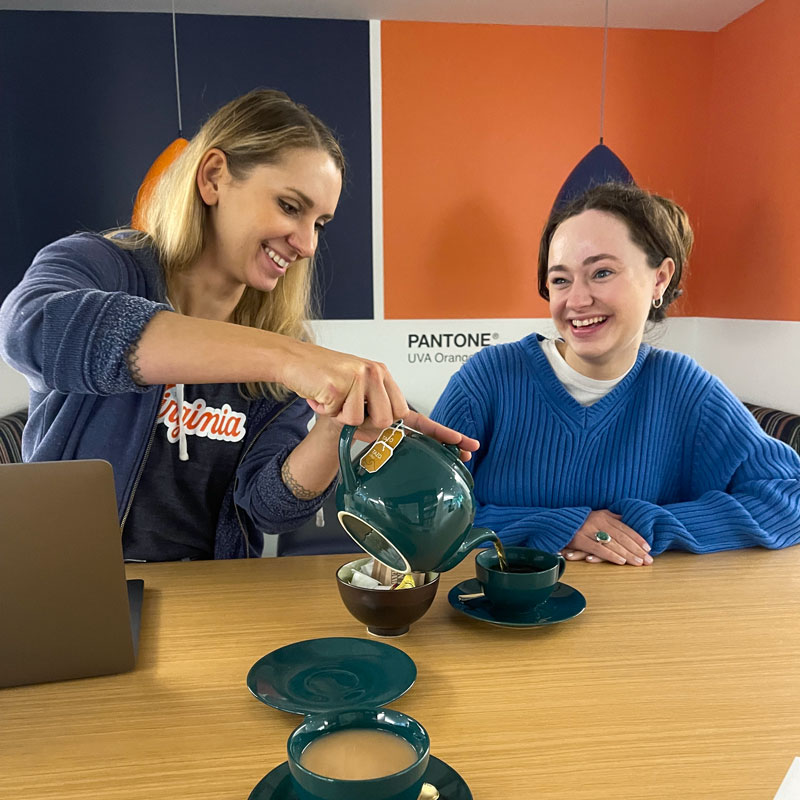 Alexandra Angelich and Alice Berry sharing tea