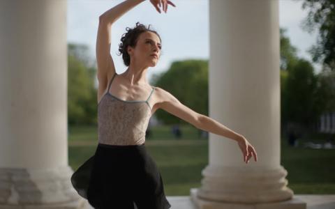 Molly Yeo dances on the Rotunda Lawn entrance