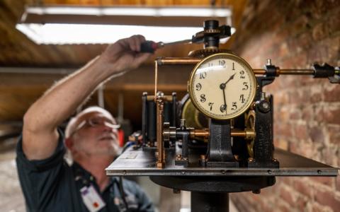 Dave Roberts tinkering with a clock