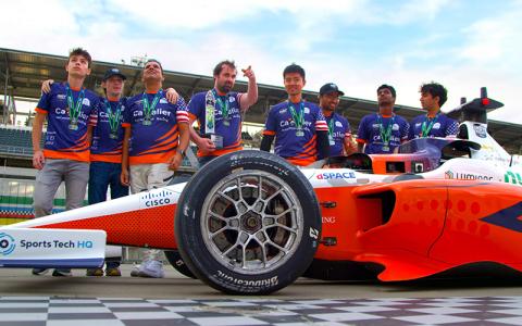 The Cavalier Autonomous Racing team behind their winning vehicle